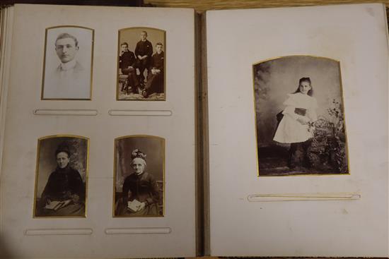 A photograph album and an album of 19th century and later greetings cards and postcards